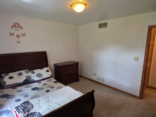 Building Photo - Updated 4 bedroom Greenfield ranch home