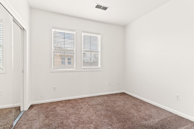 Building Photo - Spacious 3-Bedroom Dublin Townhome with Private Balcony & Fireplace