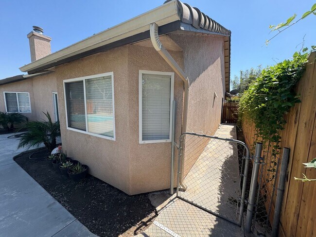 Building Photo - Beautiful home with pool Available Now!