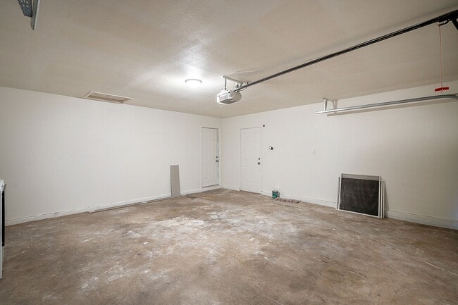 Building Photo - Updated home with large backyard & 2 car g...