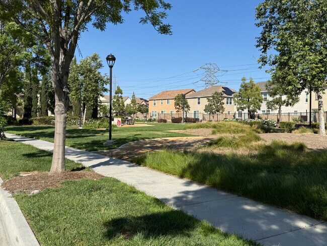 Building Photo - This beautiful home is on corner lot and with energy efficient features including solar.  New flo...