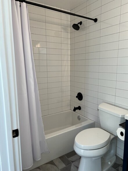 Brand new tile and fixtures - 3213 Maine Ave