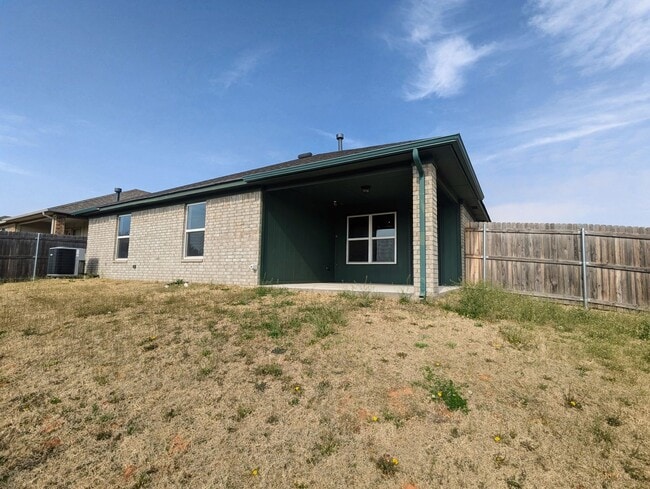 Building Photo - Spacious Yukon Home with Storm Shelter, 2-Car Garage & Fenced Yard!