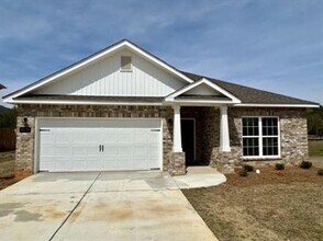 Building Photo - Relax & Unwind in This Peaceful 4 Bedroom ...
