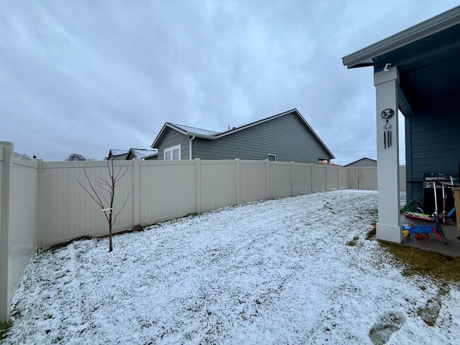 Building Photo - New Construction 4 Bed Mead School District Rancher w/ Fully-Fenced Yard and Attached Garage!