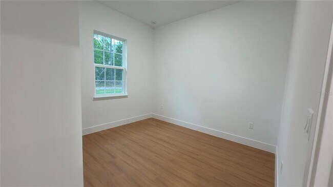 Building Photo - 7250 N Freeport Cir