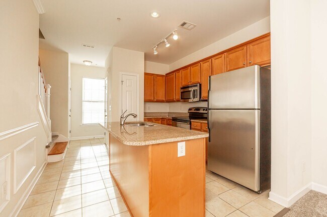 Building Photo - Located just Steps from Shopping, Dining, ...