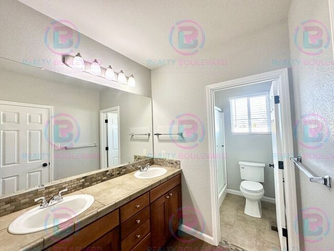 Building Photo - South Meadows 3-Bedroom 2 Bath Home New paint and Carpet Mt. Rose Views & Covered Patio