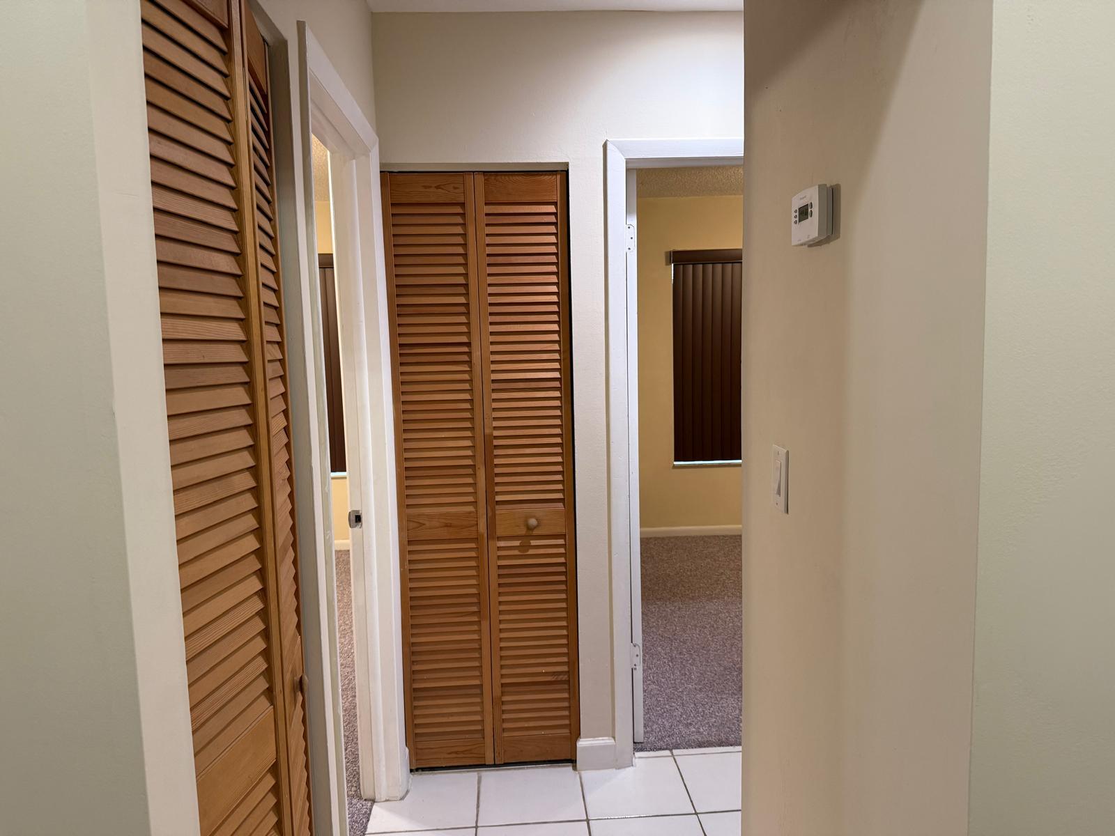 Hallway and two spacious linen closets - 13169 SW 91st Ct