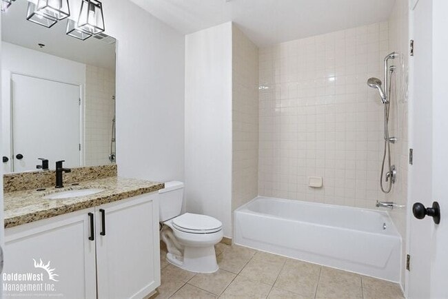 Building Photo - Immaculate 1Bdm 1Ba Condo with Massive Private Patio in the Diamond Terrace Building in Prime Dow...