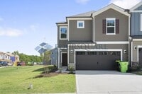 Building Photo - End-Unit Townhome with Loft, Open Floor Plan & Patio, Conveniently Located Near Dining, Shopping,...