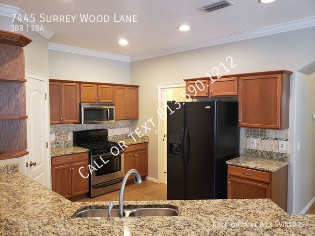 Building Photo - 7445 Surrey Wood Ln