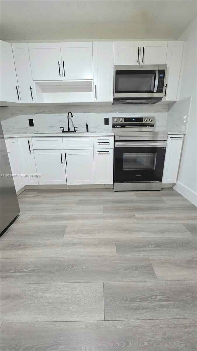 Building Photo - 6616 Raleigh St