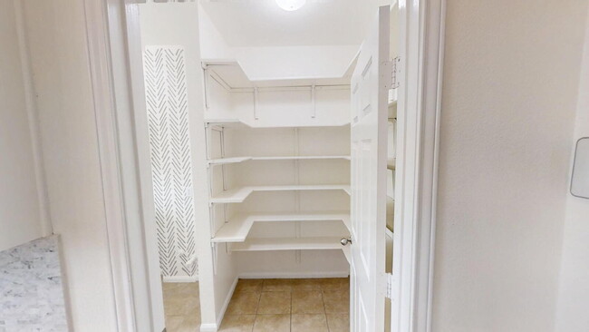 Building Photo - Expansive Living and Stylish Updates in So...