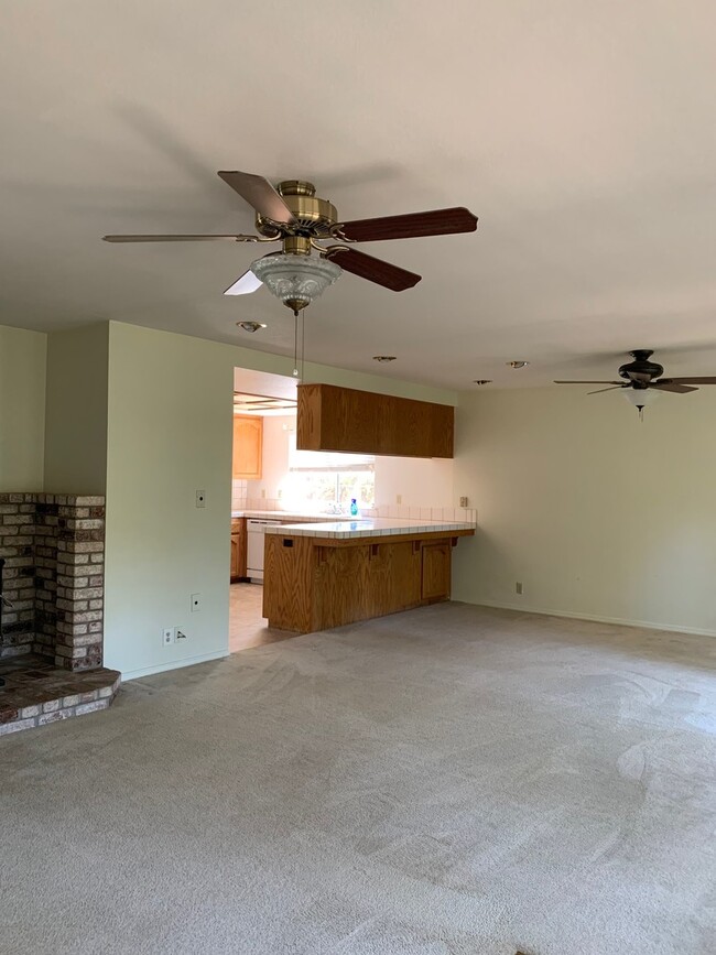 Building Photo - Spacious 3-Bedroom Home with Greenbelt Views & Landscaping Included
