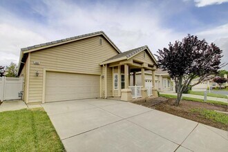 Building Photo - Cute one story in a 55 or better gated community.