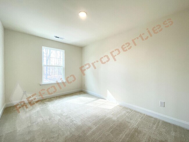 Building Photo - Modern Comfort Meets Peaceful Living—Stunning 3 Bedroom Townhome Near Downtown Raleigh Available ...