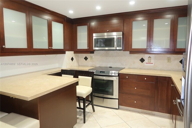Building Photo - 9801 Collins Ave