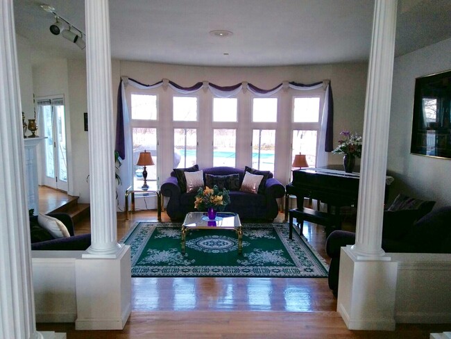 Sunkin living room with grand piano - 6245 Iron Bridges Rd