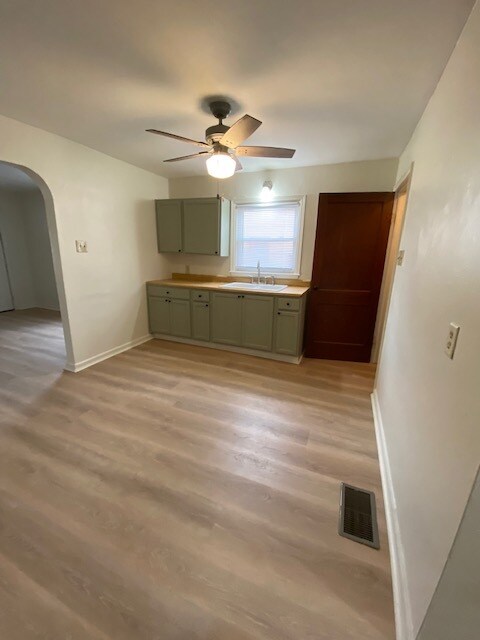 Kitchen sink and cabinets - 2611 E Troy Ave