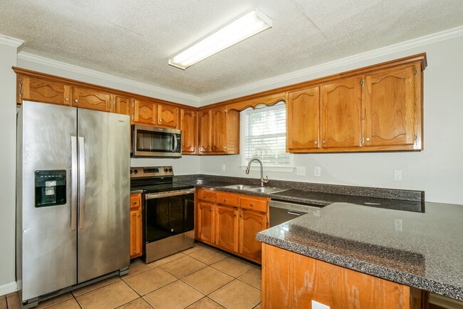 Building Photo - 6671 Hidden Fern Ln E