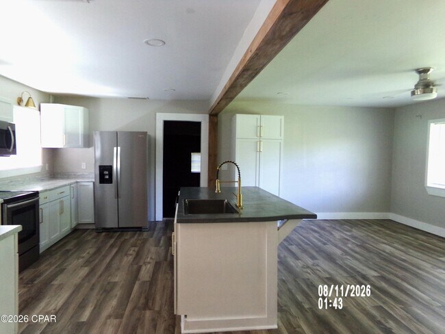 Building Photo - 6530 Dahlia Dr