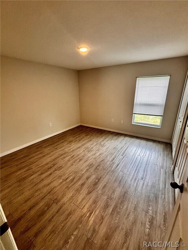 Building Photo - 9437 N Travis Dr
