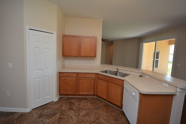 Building Photo - "Spacious 4-Bed Oasis in Palm Coast with 2...