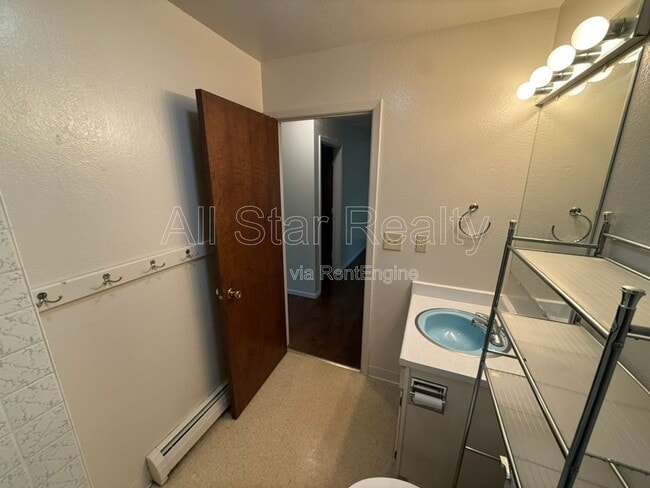 Building Photo - 5701 E 98th Ave