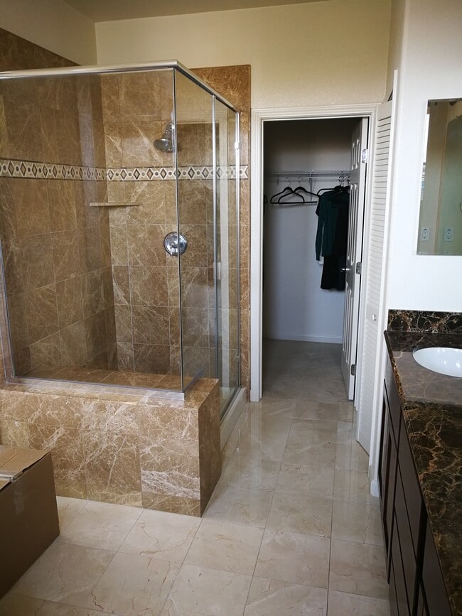 master bath with bathtub and separate shower - 4791 Perugia St
