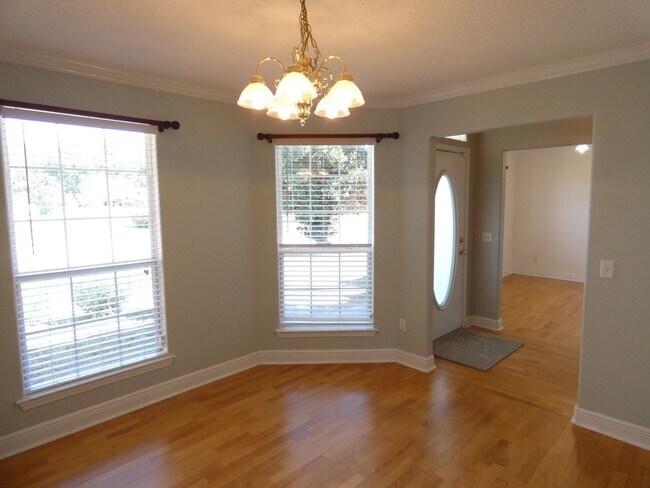 Building Photo - Charming 4-Bedroom Home With Sunroom