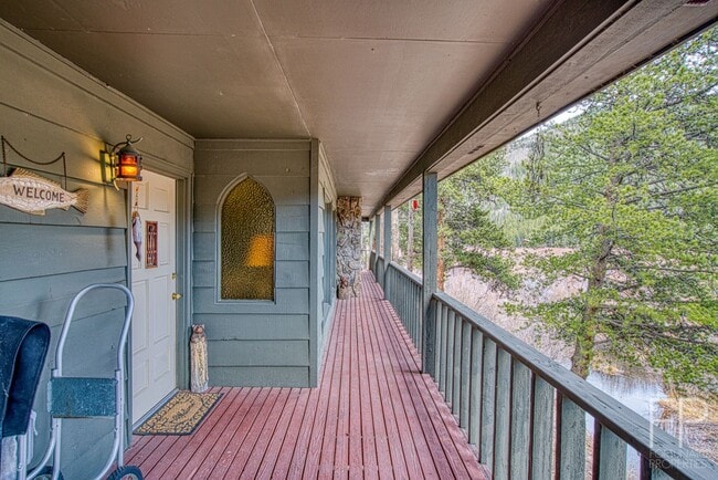 Building Photo - On the Blue River!  HUGE 4 Bedroom home, Furnished Updates throughout!  Bus route!  Spacious parking
