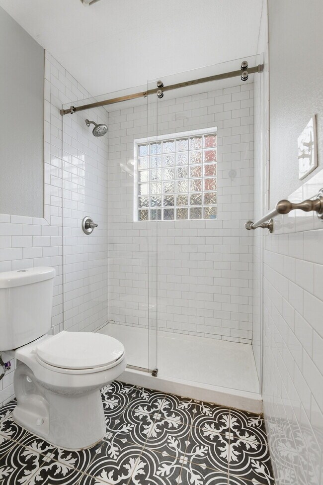 Building Photo - $3,045.95, 3 bed, 2 bath house in Denver with Fenced in Yard and In Unit Laundry!