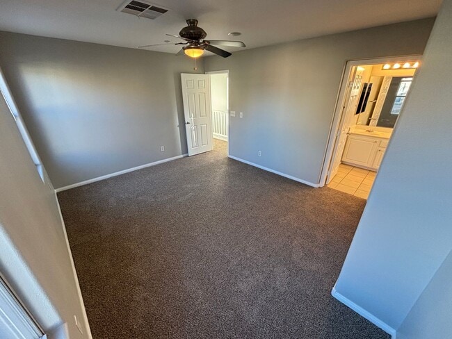 Building Photo - Beautiful Trilevel 3 Bed/3bath/2 car home located in Northwest Las Vegas. Make the Move for Less:...