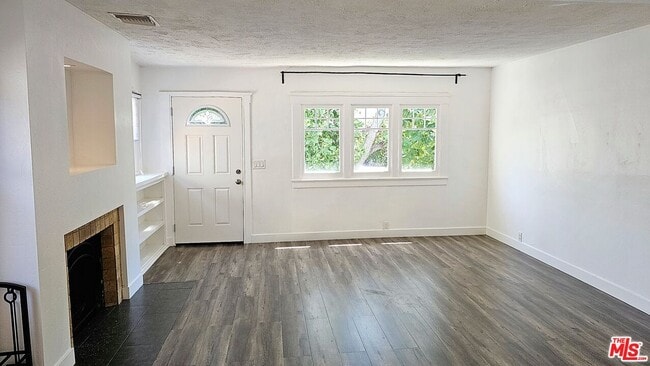 Building Photo - 1209 N Genesee Ave