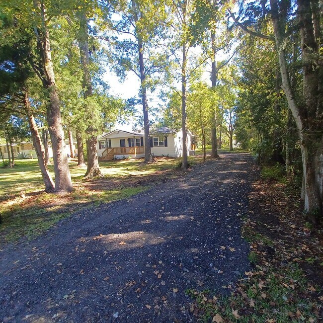 Building Photo - Waterfront 3 BR 2 BA Remodeled Rental Home