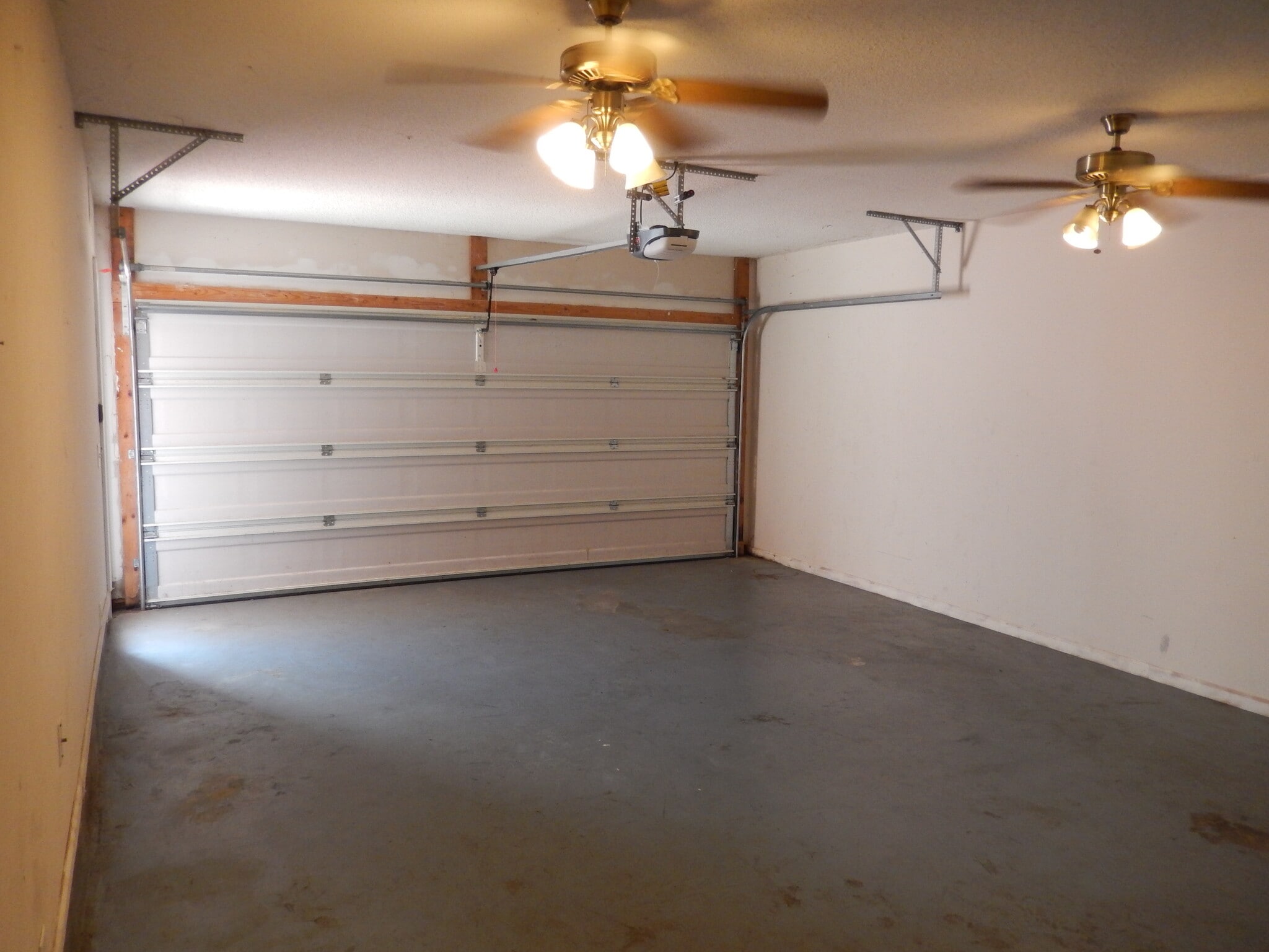 Inside of Garage with Ceiling Fans Installed - 2065 Pinemount Blvd