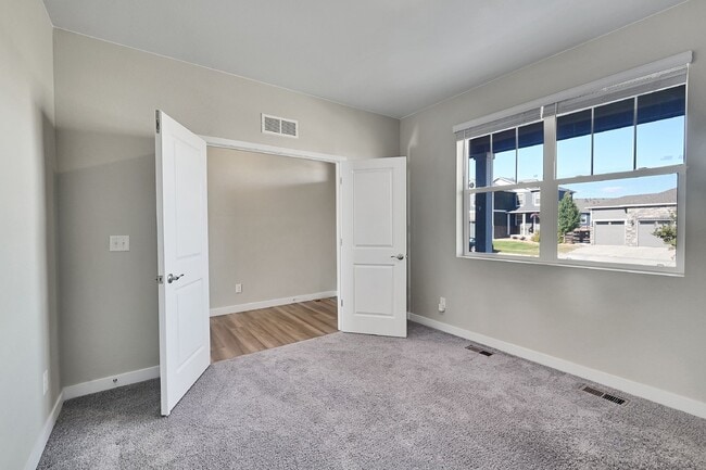 Building Photo - $3,190.95 - 5 Bed, 3 Bath Home in Thornton with Cozy Fireplace and Fenced-in Yard