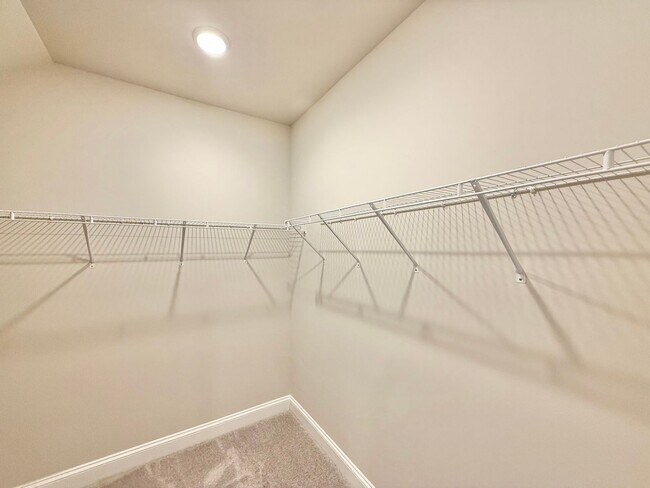 Building Photo - Stunning New Construction 2BD, 2.5BA Cary Townhome-Style Condo with a 1-Car Garage & Bonus Flex S...