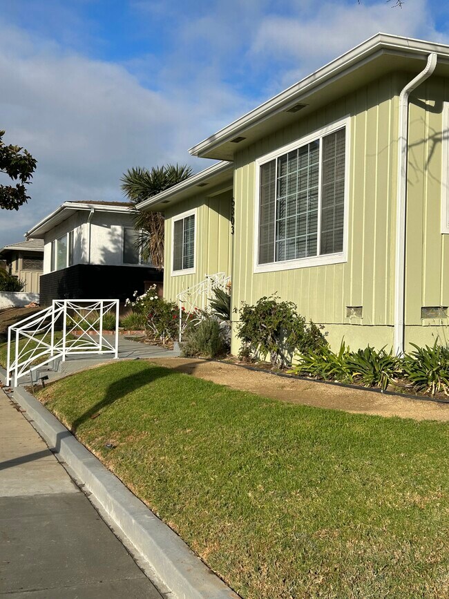 Front yard and entry way from NWC Slauson & Corning Avenue - 5303 W Slauson Ave