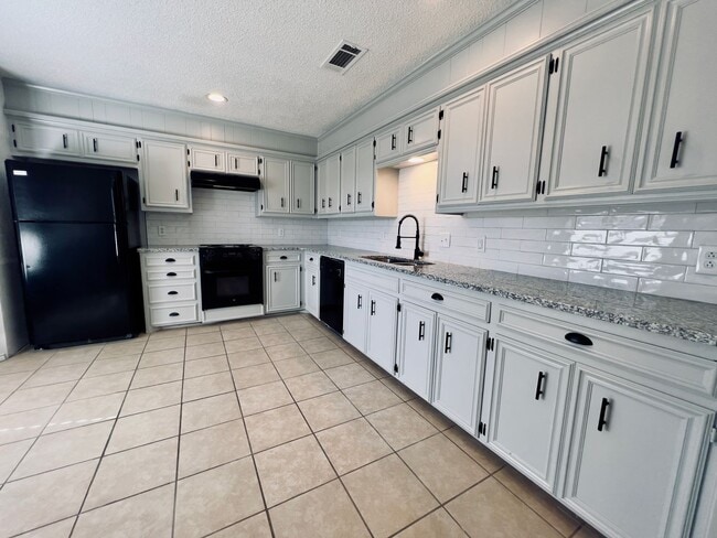 Building Photo - Completely Updated 3/2/2 in The Meadows close to Preston Smith Elementary