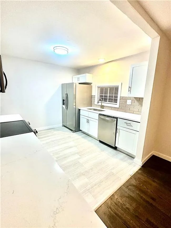 Building Photo - Welcome Home to Comfort, Space & Style!