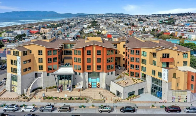 Building Photo - Live at the beach! Modern 2 bedroom 2 bath condo blocks from the beach w/parking and washer/dryer...