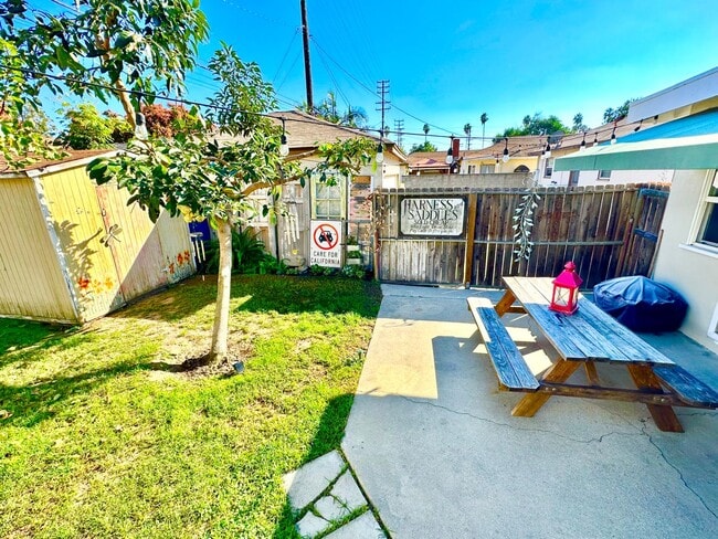 Building Photo - 3 Bedroom 2 Bathroom Lakewood House with Private Backyard down the street from Lakewood High School