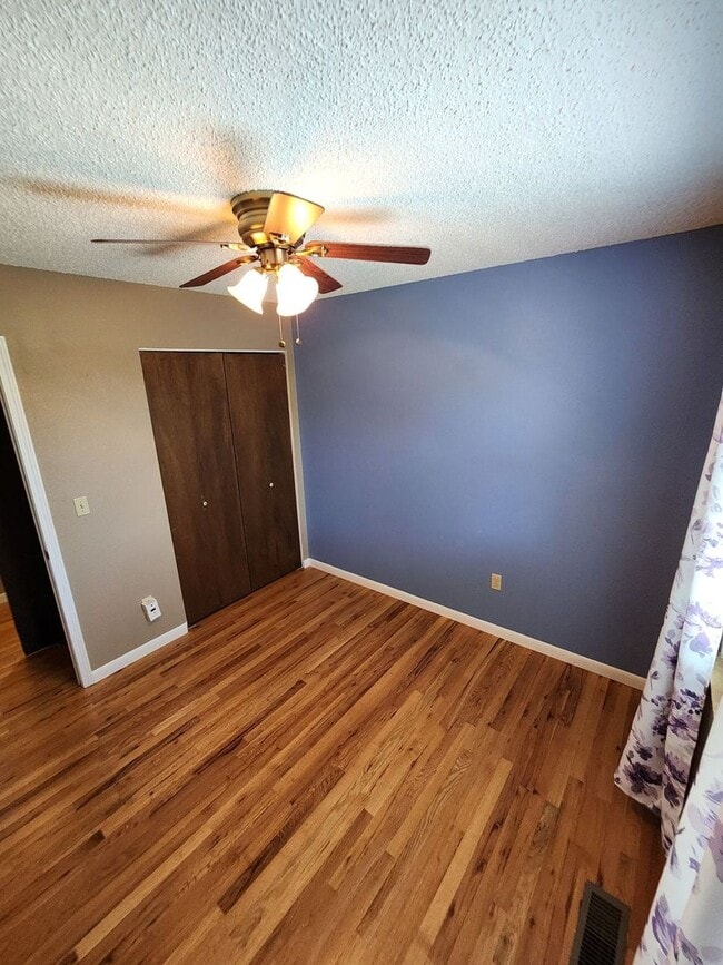Building Photo - Spacious 4-Bedroom Home with RV Parking in...