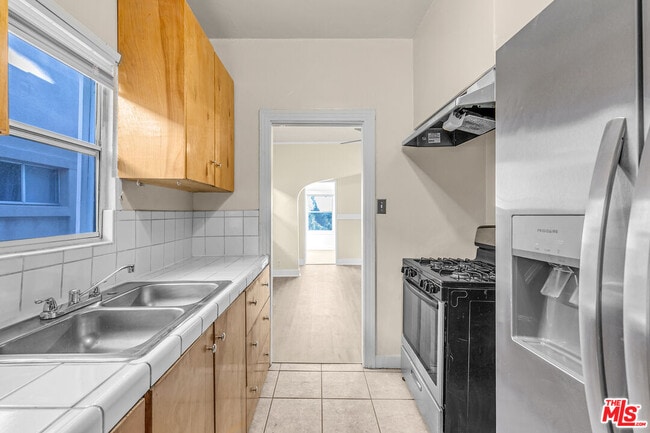 Building Photo - 3801 1/2 Mont Clair St