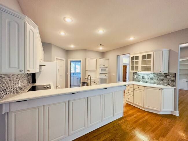 Building Photo - {6411} Enchanted Lake Estates + Updated Kitchen, Fresh Paint Throughout +  Main Floor Primary Bed...