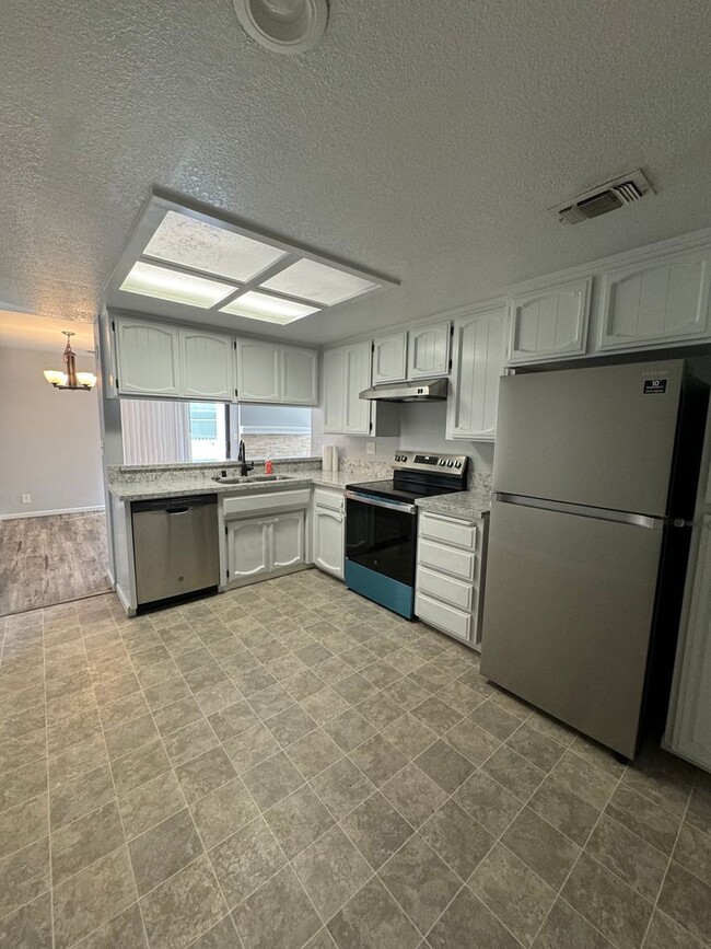 Building Photo - Remodeled 2-Bed, 2-Bath Condo for Rent Nea...