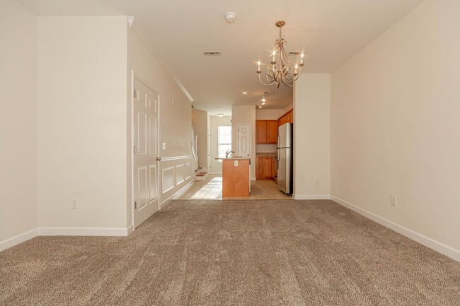 Building Photo - Located just Steps from Shopping, Dining, ...
