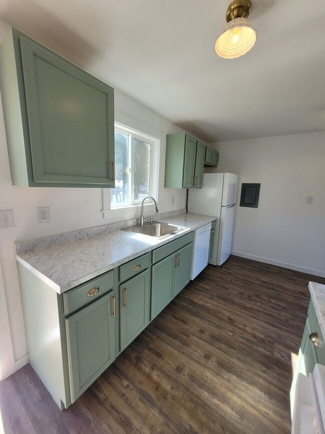 Building Photo - Free May rent with 1 Year Lease - Fully Remodeled with Garage & Yard Care Included